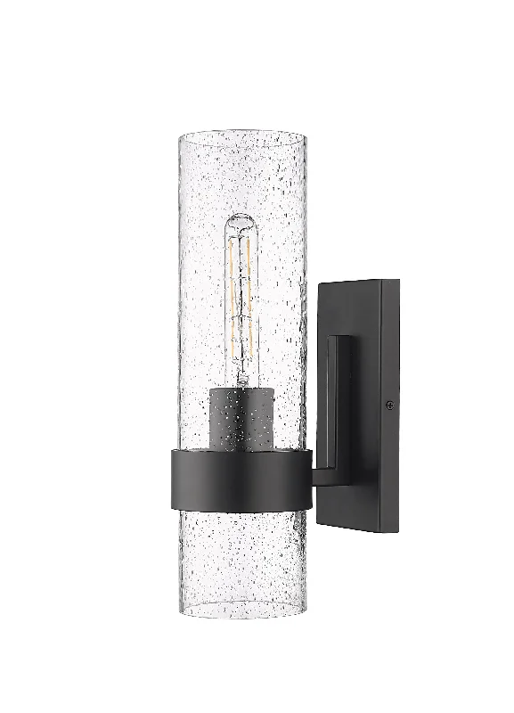 Low - Bay Industrial Lighting Fixtures for Small FactoriesWall Sconce - Matte Black - Clear Seeded Glass - 7.25in. Extension - E12 Candelabra Base Low - Bay Industrial Lighting Fixtures for Small FactoriesWall Sconce - Matte Black - Clear Seeded Glass - 7.25in. Extension - E12 Candelabra Base