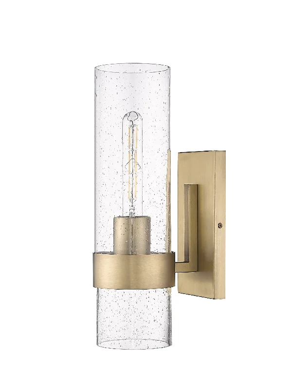 Industrial Lighting for Woodworking FactoriesWall Sconce - Vintage Brass - Clear Seeded Glass - 7.25in. Extension - E12 Candelabra Base Industrial Lighting for Woodworking FactoriesWall Sconce - Vintage Brass - Clear Seeded Glass - 7.25in. Extension - E12 Candelabra Base
