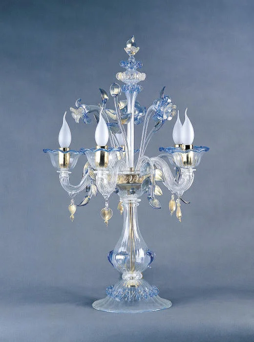 Chandeliers with Frosted Glass for a Softer Light DiffusionClear Murano Glass Flambeau Table Lamp With Blue Flowers Chandeliers with Frosted Glass for a Softer Light DiffusionClear Murano Glass Flambeau Table Lamp With Blue Flowers
