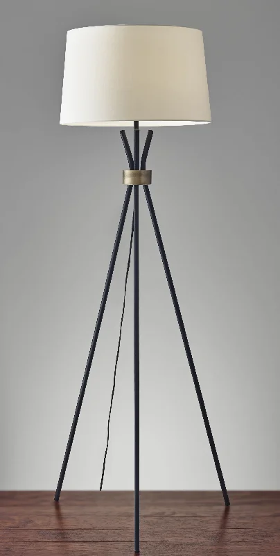 Way Switch Floor Lamp for Multiple Light Intensity LevelsBlack Metal Tripod Leg Floor Lamp with Antique Brass Accent By Homeroots Way Switch Floor Lamp for Multiple Light Intensity LevelsBlack Metal Tripod Leg Floor Lamp with Antique Brass Accent By Homeroots